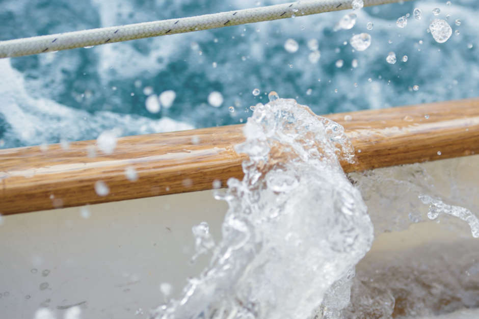 wave splashing over a gunwale